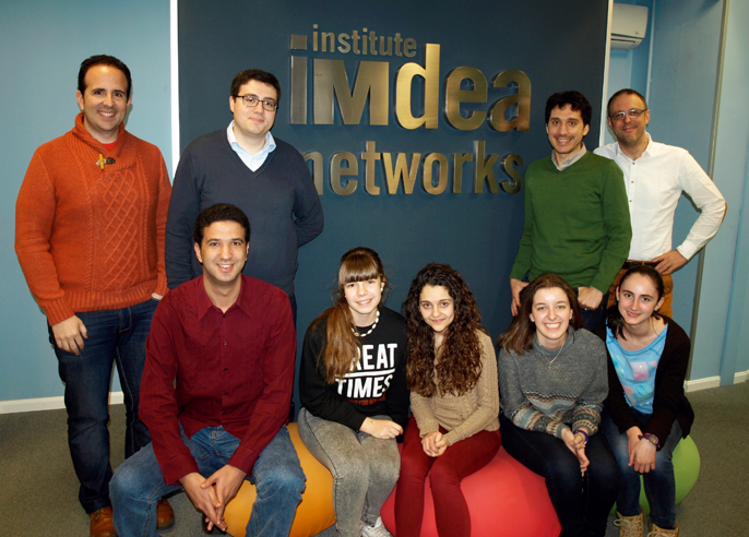 Students surrounded by researchers